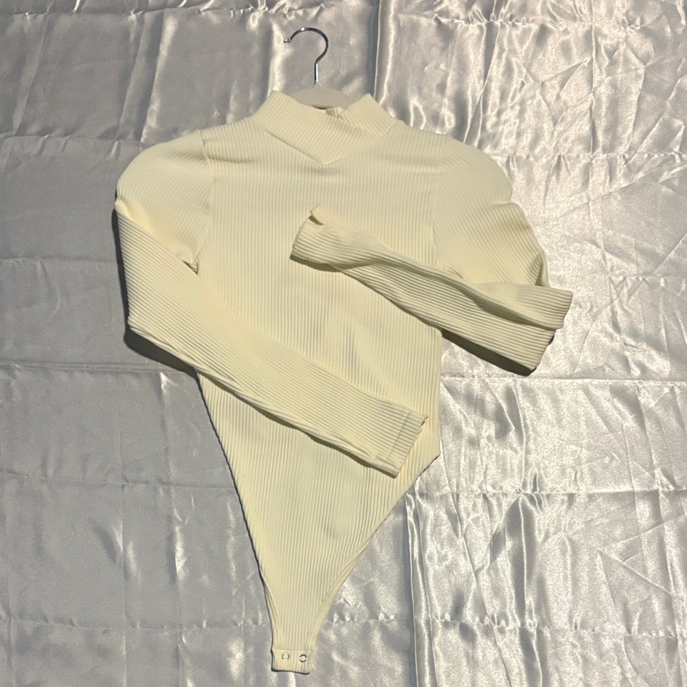 Elegant Cream Ribbed Bodysuit